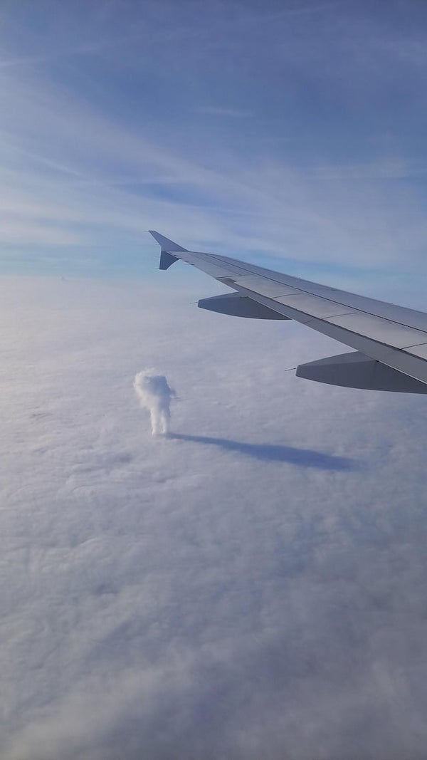 Steam from nuclear power plant breaks through clouds (Nogent-sur-Seine, France)