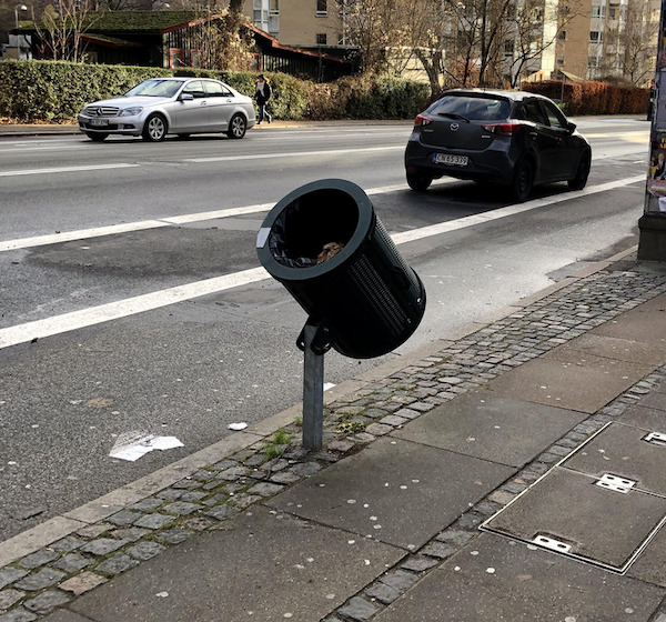 Some of the trash cans in Copenhagen are tilted so people on bikes can throw out trash while riding.