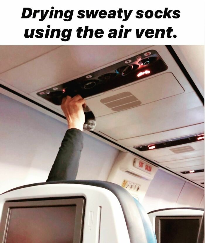 airplane dry socks - Drying sweaty socks using the air vent.