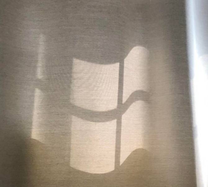“The sunlight on this curtain looks like the Windows logo.”
