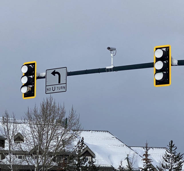 “Stoplights in Lake Tahoe filled with snow due to not having the bottom cut out to prevent snow accumulation.”