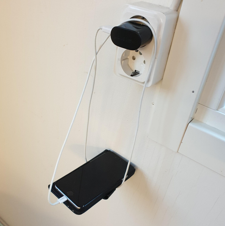 “My friend’s solution to charging a phone from an outlet that’s too high up”