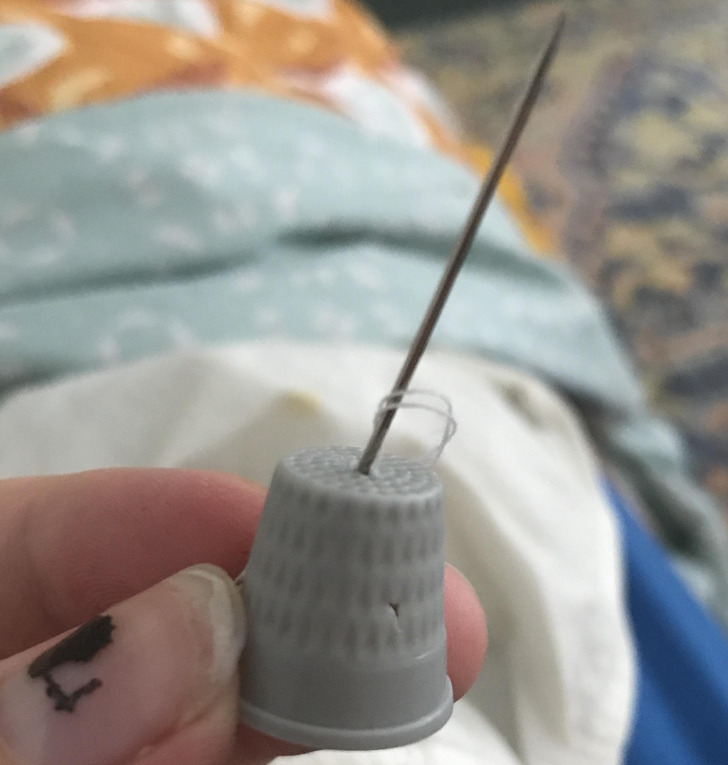 “Wore a thimble so I don’t stab my finger, but the back of the needle went straight through and stabbed me in the finger.”