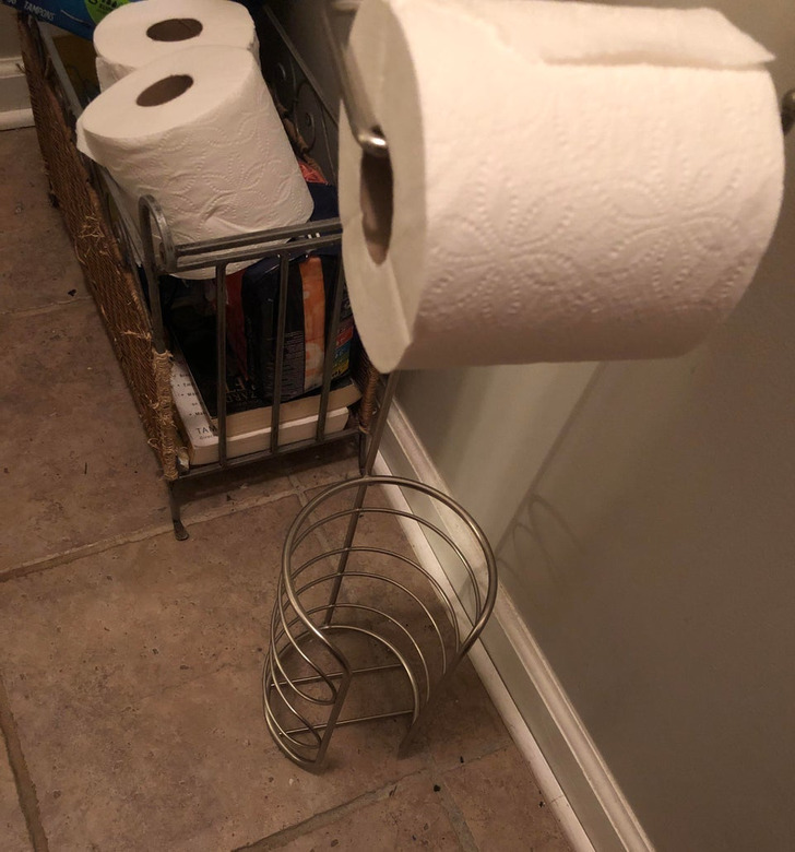 “My wife bought this toilet paper holder, and yet...”