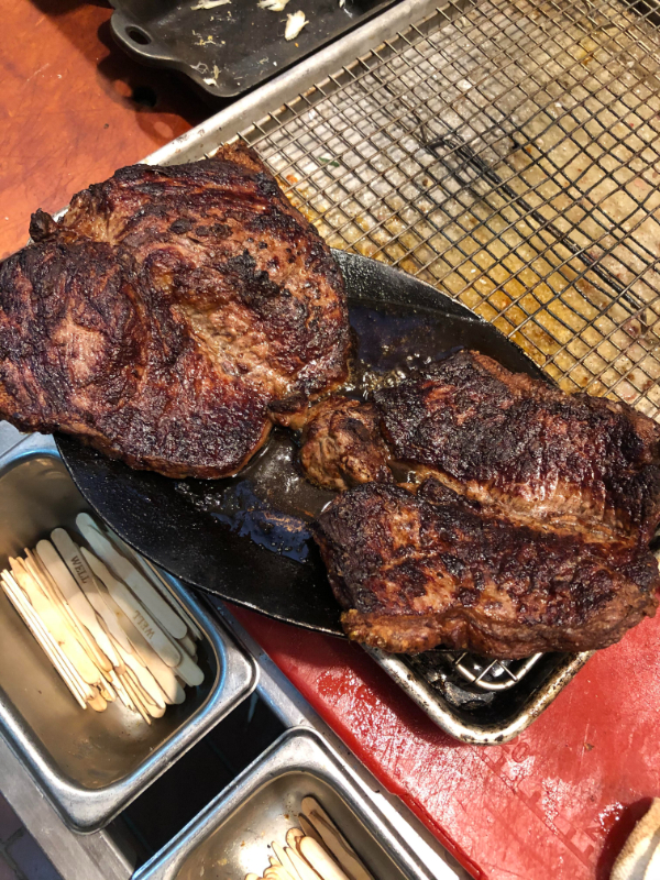 “When the customer orders two $70 30 day dry aged NYs, butterflied and well done…”