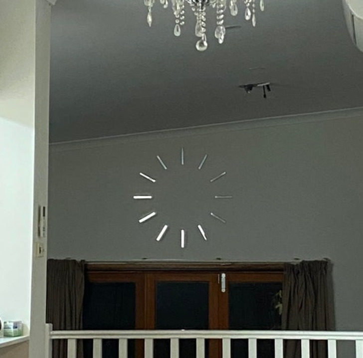 pics to make you double take - My (handless) clock makes it look like the wall is buffering