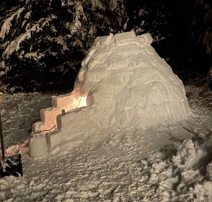 “My wife and I built this igloo over Christmas (and put a fire pit inside).”