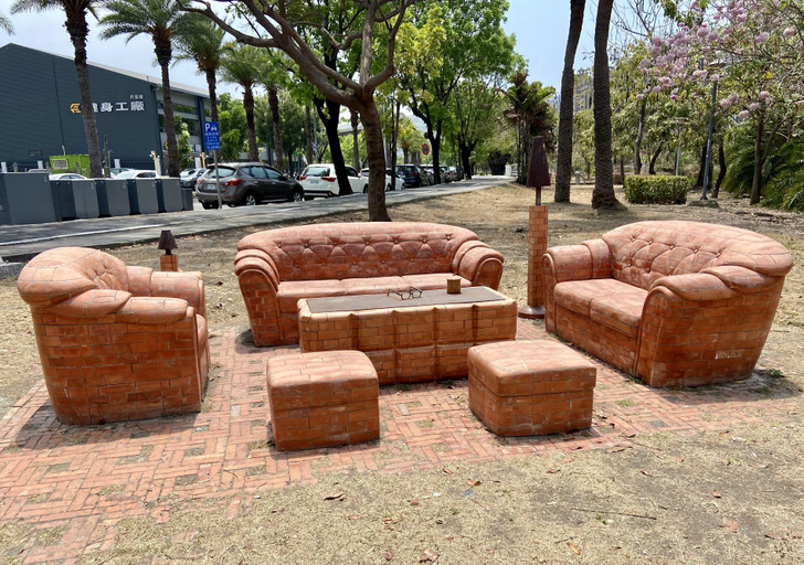 “This sofa set made out of red bricks”