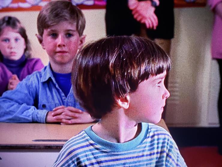 "In the Santa Clause(1994) when Charlie is at school you can see an elf behind him in class meaning they were keeping tabs on him and his dad"