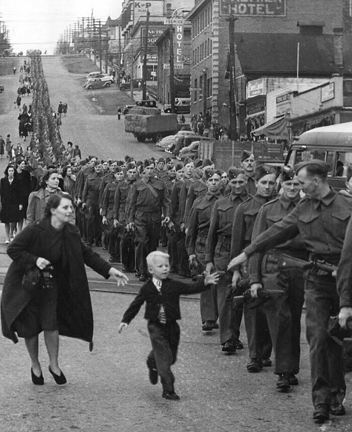 fascinating photos form history  - ‘Wait For Me, Daddy’ A Photo By Claude P. Dettloff Depicts Private Jack Bernard, B.c. Regiment Saying A Final Goodbye To His Son Warren | New Westminster, 1940