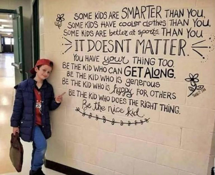 A kid trying to spread positivity. 