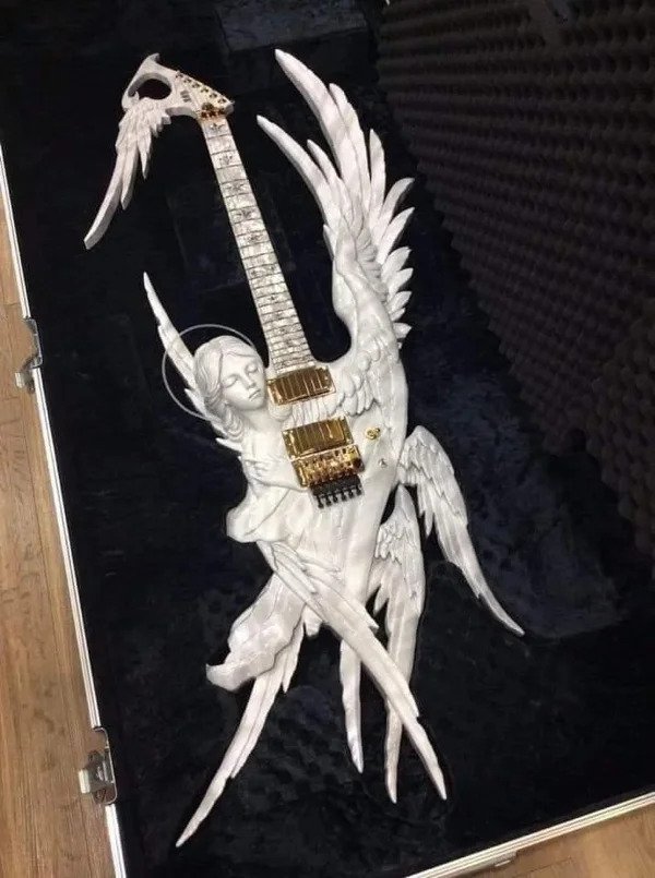 nope and cringe pics - angel guitar