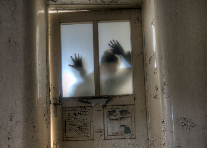forgotten news - haunted house door
