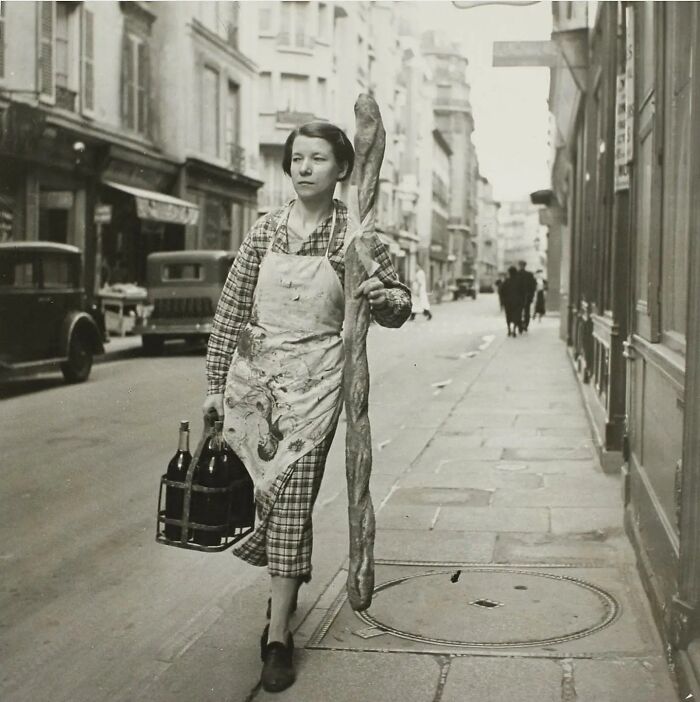 Historical photos - old photos - french woman with baguette and wine