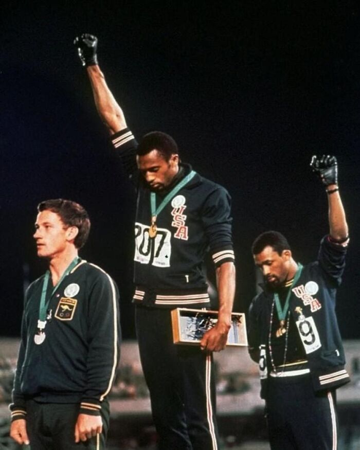ordinary people shaping history - On 16 October 1968, Black sprinters Tommie Smith and John Carlos raised their gloved fists in a Black power salute during the playing of the US national anthem as they were awarded gold and bronze medals at the Olympics.