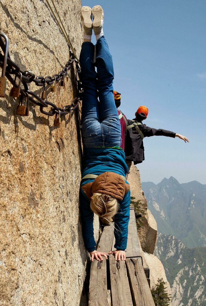 Intertim's GF Doing A Handstand On The Side Of Mt Huashan, China