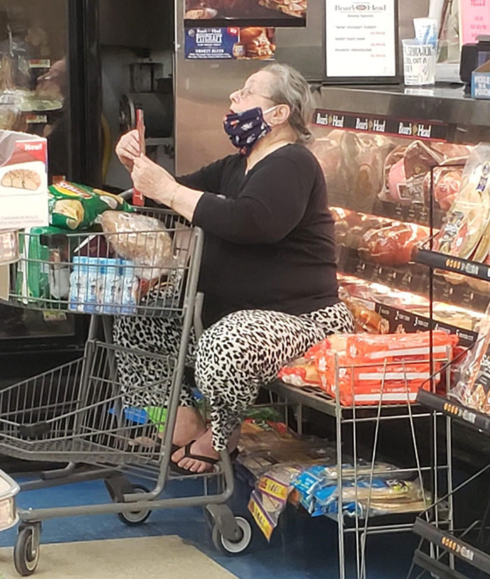 jerks - selfish people - woman sitting on bread in grocery store