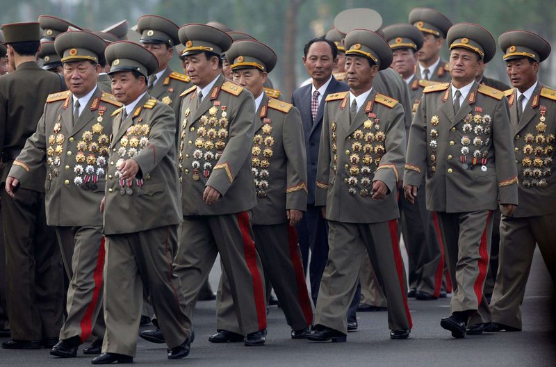 North Korean generals wear the medals of their fathers and grandfathers