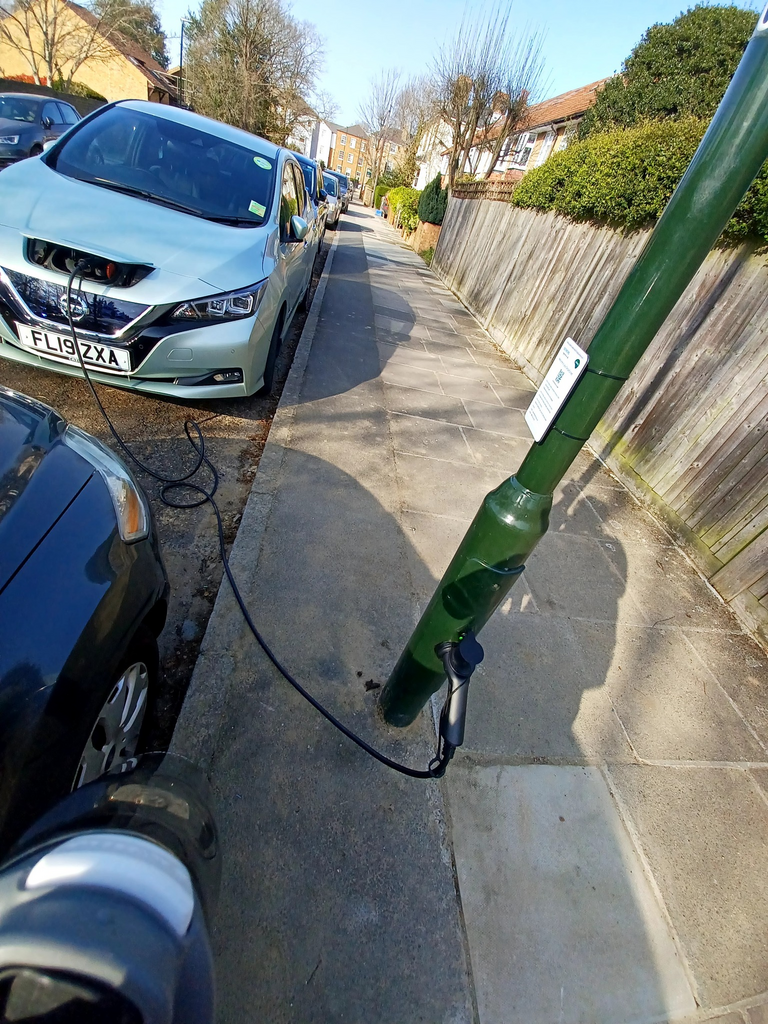 Lamp post are being turned into dual purpose electric car charging points in some parts of England.