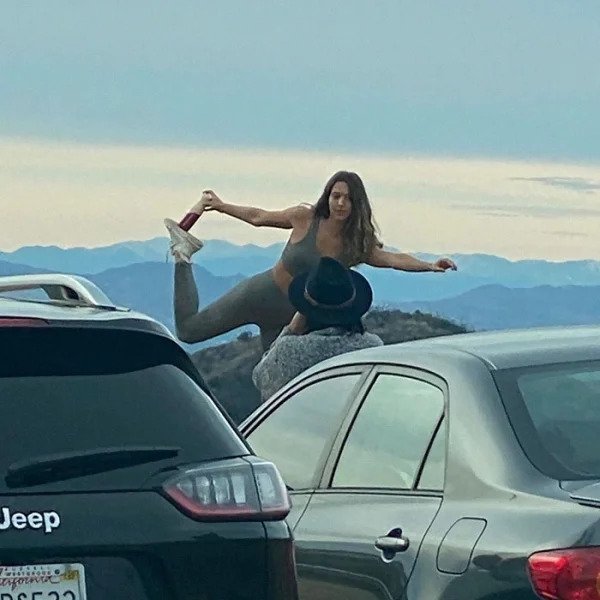 Influencers taking absurd pics - vehicle door - Cou Cr Jeep