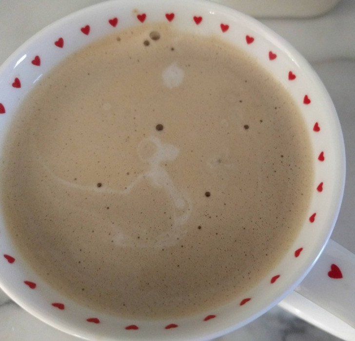 “After I poured milk into my coffee, I found Snoopy on the doghouse under the moon.”