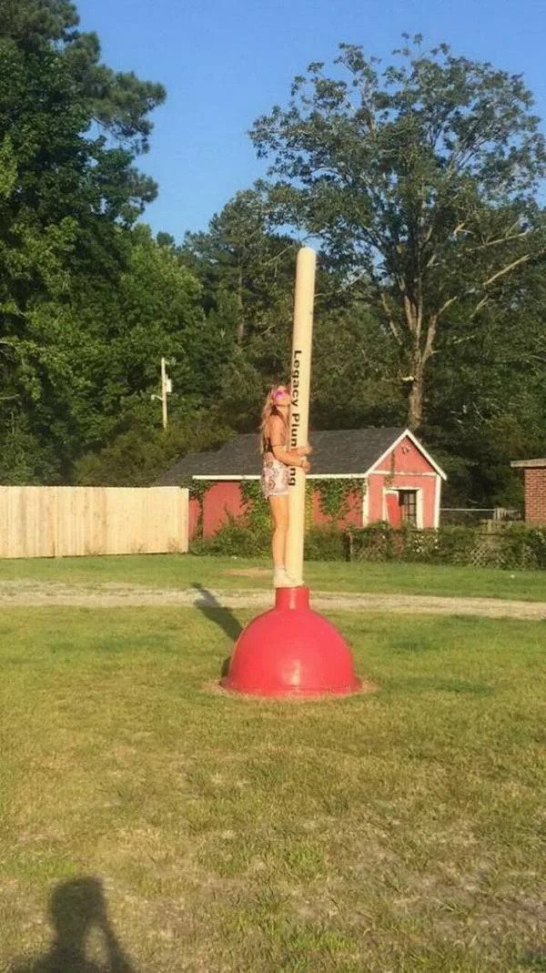 huge versions of things - giant plunger