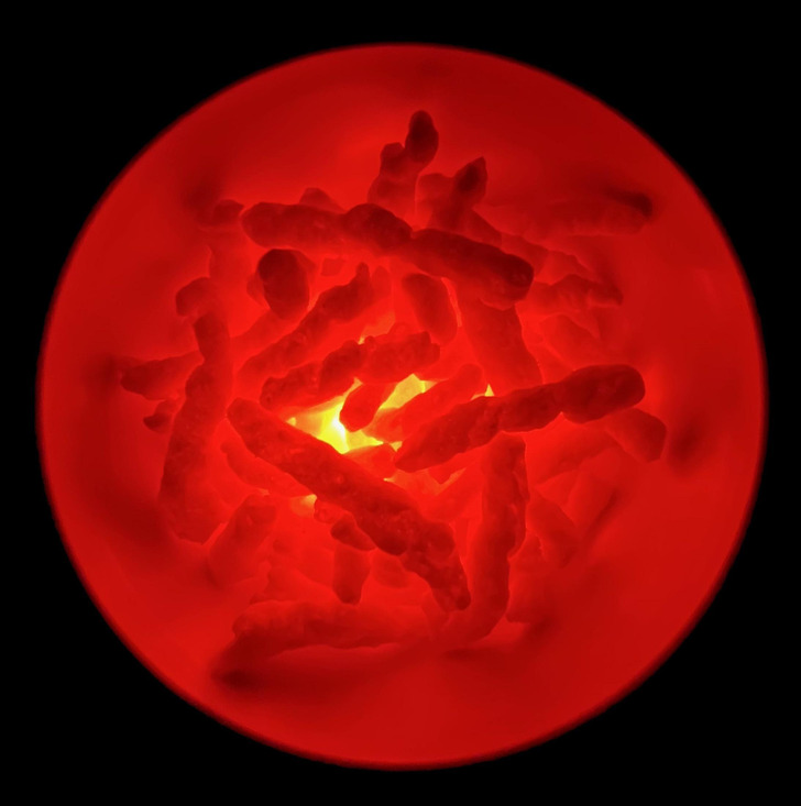 “This photo I took of a bowl of illuminated Cheetos looks like a microscopic organism.”