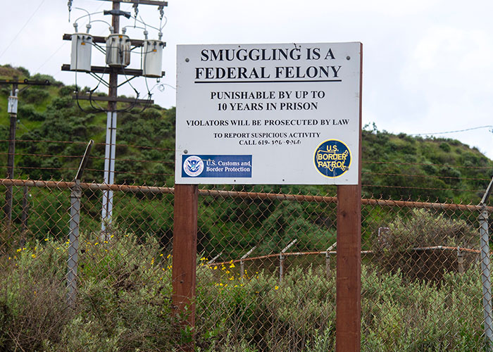 Stupid Rules - nature reserve - Smuggling Is A . Federal Felony Punishable By Up To 10 Years In Prison Violators Will Be Prosecuted By Law To Report Suspicious Activity Call 619106000 U.S. Border U.S. Customs and Patrol Border Protection