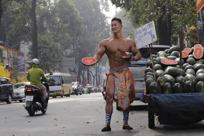 absolute units - bodybuilder selling watermelons