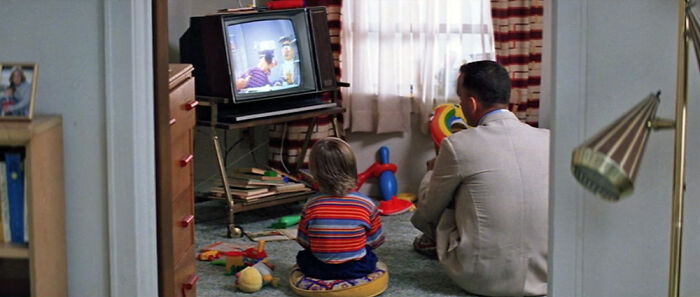 Forrest Gump- When Jenny Introduces Forrest To His Son, They're Wearing The Same Outfits As Burt And Ernie And Are Also Leaning To The Left Just Like Them.