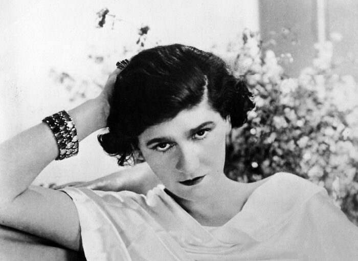 Coco Chanel was a goddamn Nazi spy. Yes, she was an incredible designer, and she's probably one of the most influential humans of the 20th century, based on the number of people who have worn clothing directly inspired by her over the past 100 years. She really did change the way women dress in a truly radical way, and I respect that - knitwear, feminized menswear, ditching the corset, transforming black into an everyday color, the essential skirt suit, costume jewelry, synthetic fragrances in perfume, the list goes on.

But she was a goddamn Nazi spy. Coco was a wretched anti-Semite, like so many other members of the European elite during the 30s. She dated a number of staggeringly wealthy British aristocrats and they'd all sit around talking about the Protocols of Zion and s**t, trying to figure out whether any members of the royal family were secretly Jews, etc. When war broke out, the two Jewish brothers who ran her perfume empire (aka Chanel No 5, the best selling perfume in the world then and now) had to flee to the US for safety. How did Coco respond? By writing to the Nazis to ask them to transfer ownership over to her, a good Aryan, so she could make more money. But that's not the half of it.

She fell in love with a dashing German spy named "Spitz" who'd been seducing bluebloods all over France and England for years leading up the war. Coco was a useful woman - she was simply one of the richest women in the world, and she knew everyone in the British aristocracy, including her old hunting buddy and dear friend, Winston Churchill himself. She and Spitz socialized with all the biggest Nazi names in town, especially Otto Abetz, the Nazi ambassador to France, who invited them to every party in town. Spitz convinced her to join the Abwehr (aka the German secret service) and make trips to Spain. Operating under the code name "Westminster", she attempted to broker a "separate peace" between Germany and England. (In the meantime, she may or may not have reported at least one woman at the Hotel Ritz whom she suspected of being Jewish to the SS.) She had a grand old time going on her adventures, and wrote about the excitement of working for the Abwehr in her private notes.

Chanel was arrested only a few days after the liberation of Paris - absolutely everyone in town knew what she'd been doing and who she'd been doing it with - but for rEaSoNs UnKnOwN she was released without charges. It's widely believed that Winston Churchill personally intervened. It might be because the two of them had been close friends for decades. It might be because she was going to embarrass the s**t out of Britain by outing all the anti-Semites and pro-Nazis in the British aristocracy - including the recently abdicated Edward VIII who used his f***ng honeymoon as an excuse to tour Nazi Germany and shake Hitler's hand. She spent the rest of her life being a nasty, bitter morphine addict living in the Hotel Ritz. The House of Chanel has very, very little to say about the matter, and every few years a few more bits of damning evidence are declassified from the vaults.

If you want to learn more, I did a whole episode about her Nazi days in my French history podcast: "The Collaborator"