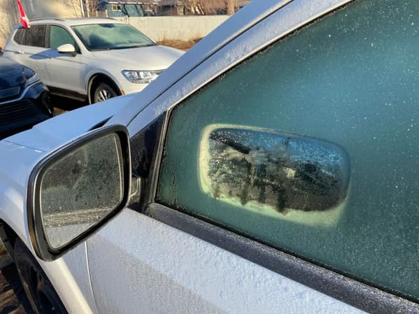 “The sun reflecting off my side mirror melted a mirror-shaped hole in the frost on the window”