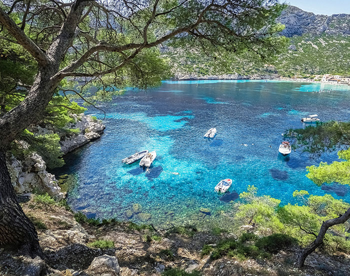 in the 70's and 80's, dead acidic lakes were fairly common in the US, Europe and Canada because of acid rain. The acidity in lakes killed all microbes and aquatic life, resulting in crystal clear water that allowed the lake bottom to be visible