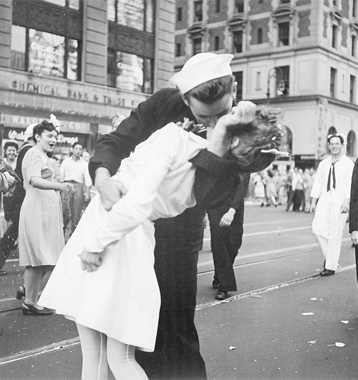 there is another photo, taken at a different angle, of the same famous Victory Day kiss in Times Square; unlike the original, the other photograph was taken by a government photojournalist on official duty, and is thus in the public domain and not protected by copyright