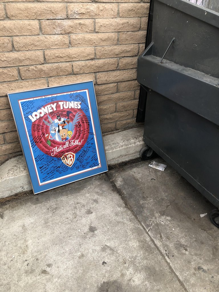 “That’s all, folks!” – a poster covered in ‘get well soon’ messages found at the dumpster