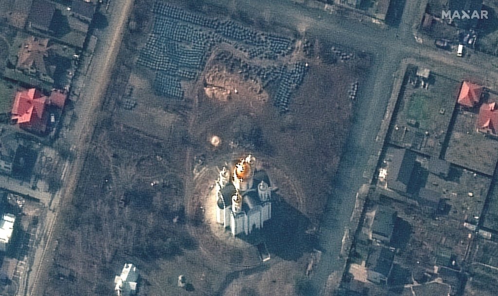 Satellite photo shows mass grave in Bucha, a village near Kyiv where streets were littered with bodies