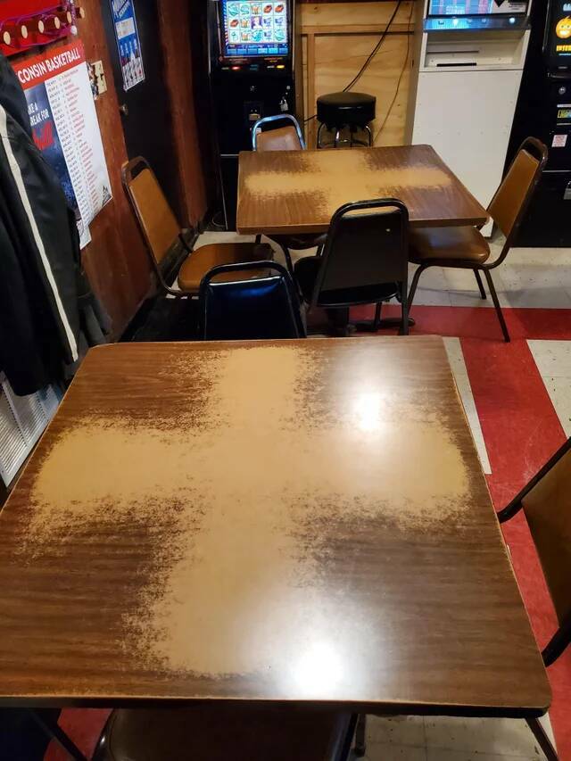 "Many games of euchre played on these bar tables: southwest Wisconsin"