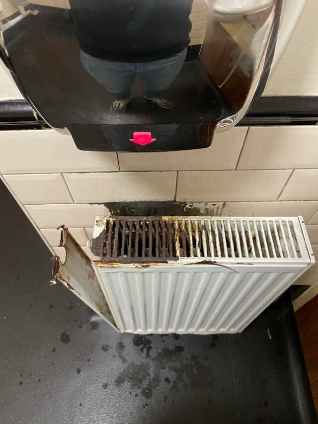 "This radiator underneath a hand dryer in a pub in Northern England"