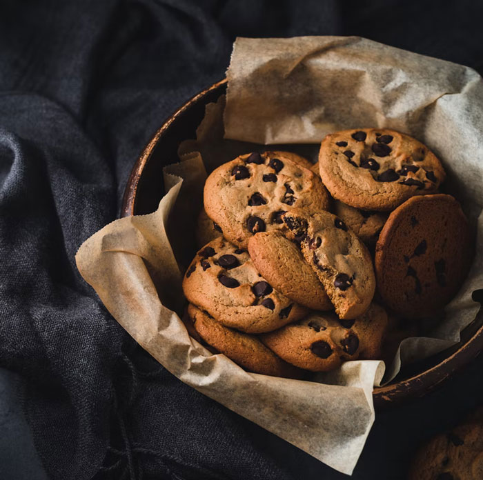 Every year at Christmas the neighbors on my street exchange homemade cookies. We just leave them on each other's door step, it's very nice. Our neighbor on the right always takes store bought and puts them in boxes like she made them herself. Everybody knows, though.