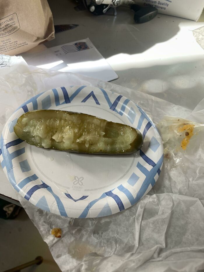 My Coworker Eats His Pickles Like A Psychopath.