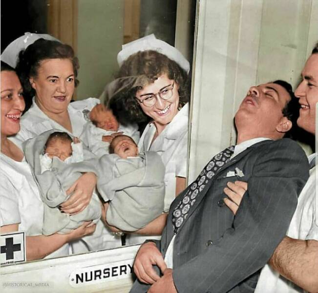 historical photos - father passes out after seeing triplets