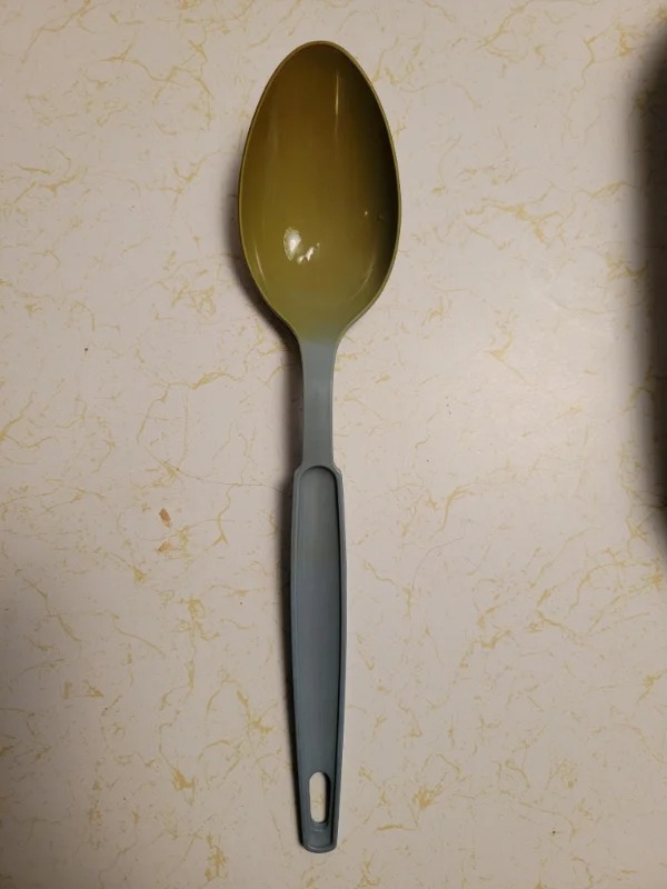 “My grandmother served us so much Kraft mac n cheese as kids, this spoon is stained from the “cheese.”