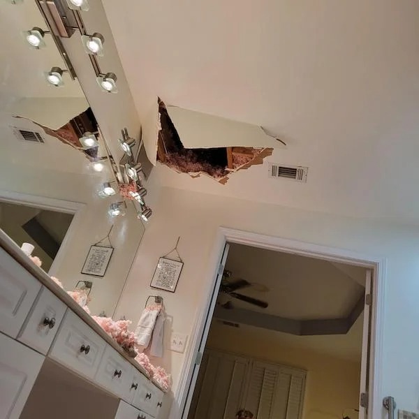 home disasters - hole in bathroom ceiling - Sa
