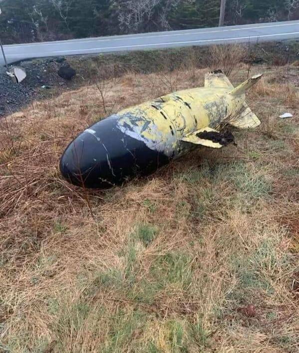 "Black and yellow, large bomb-shaped item, found 30 mins outside Halifax, N.S."<br/><br/>

"Don’t think it’s a bomb, it looks more like fishing net floaters used to keep huge fishing from dragging on the floor. (they’re usually at the bottom of the net to keep the net straight and not tangle up while the net is being dragged)"