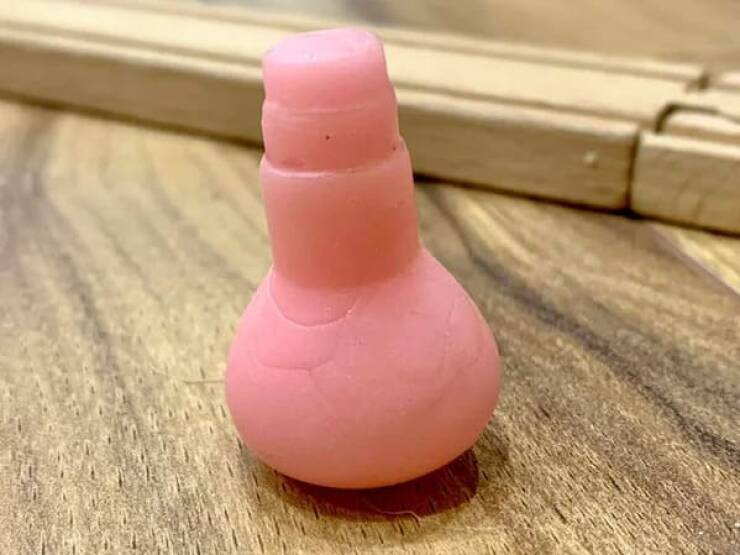 "My 3-year-old came home from an extracurricular activity where he can exchange tickets at a “store” for what’s usually dollar store items. It’s rubber/silicone, the size of a fingertip, doesn’t erase, about as hard as a bouncy ball but doesn’t bounce like a bouncy ball. Doesn’t light up. What is it?"
<br/><br/>
Looks like an 80’s light bulb eraser without the metal bottom editing to add they never really erased anything"

 <br/><br/>

"Holy smokes, you nailed it! I asked him some more about it, he confirmed that something fell off of the narrow end when he was playing with it. When I showed him the picture, he said “yes! yes!” this was exactly what it was! Thank you for solving this mystery for us!!"