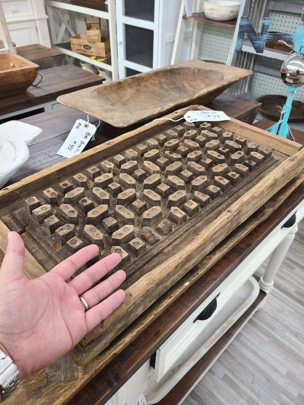 "Wooden box with a weird pattern inside and no lid. It’s approximately 18″x30″x3″."<br/><br/>

"It’s an antique cement mold."