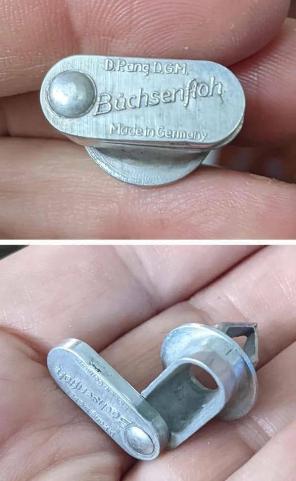 "From the antique store “junk drawer” it came in a small tin with a slip of paper that says “German Inventors Fair 1953” “Patent Applied For” “Manfred Frommberger, Nurnberg Germany”"
<br/><br/>
"Could totally be wrong here, but based on the name and shape I’d guess it’s for having a resealable tap for canned goods."

 <br/><br/>

"Seconded. There used to be small cans of ‘Kondensmilch’ (evaporated milk) from companies like ‘Glücksklee’. You stabbed a hole (or better two holes) into the top to pour (or better drip – people used it carefully) the milk."