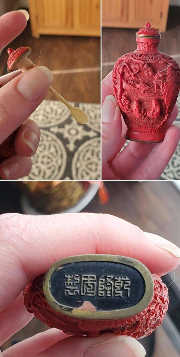"Small red container. The lid has a small spoon attached to the inside."<br/><br/>

"A snuff (powdered tobacco that you snort) bottle. The Chinese used it becuase regular tobacco was illegal, but snuff was believed to be a remedy for multiple common illnesses."
