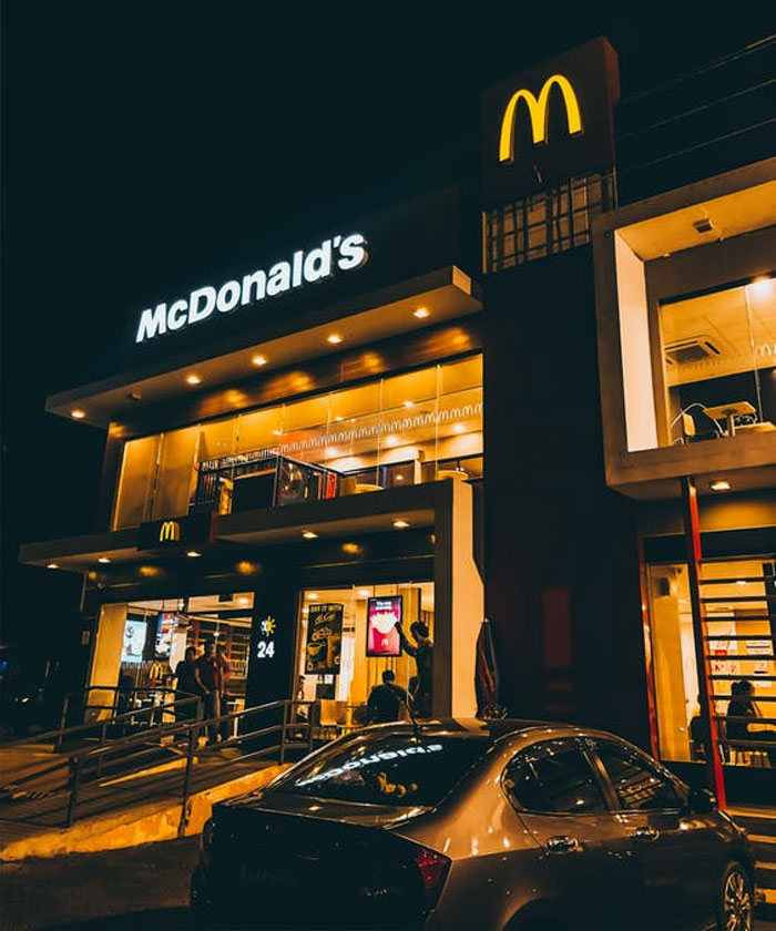 Working the window at Mcdonalds late night. Guy orders whatever and pulls up to the window. I'm cooking and handling the window, so I wasn't there when the customer pulled up. When I walked up to the window, I didn't see the f****r with trash in his lap. I open the window to take his card/cash and he throws a bag of trash at me. I take a step back, bothered that I just got trash thrown at me, and I watch his car speed off. I'm pissed, but there's nothing I can do. A couple seconds later I hear a small bang of metal on metal. I walk to the lobby and look out the windows. The douchebag slammed into a police cruiser who was about to loop around and use the drive thru himself. Of course I also went to tell the officer what just happened inside.