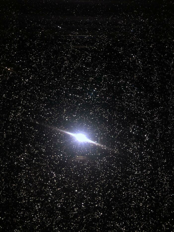 I Took A Picture Of A Window With Rain On It And It Looks Like A Planet Surrounded By Millions Of Stars